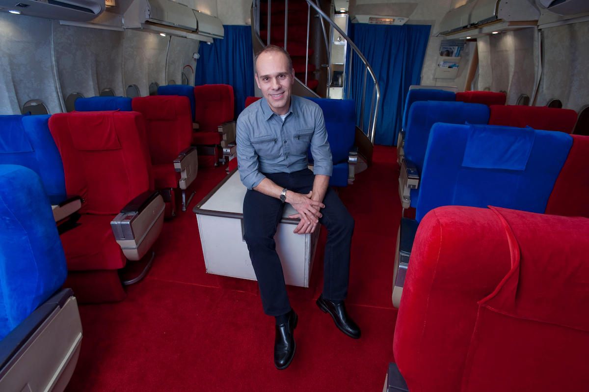 Anthony Toth at the opening of the original Pan Am Experience in 2012, a cabin he rebuilt in his garage.