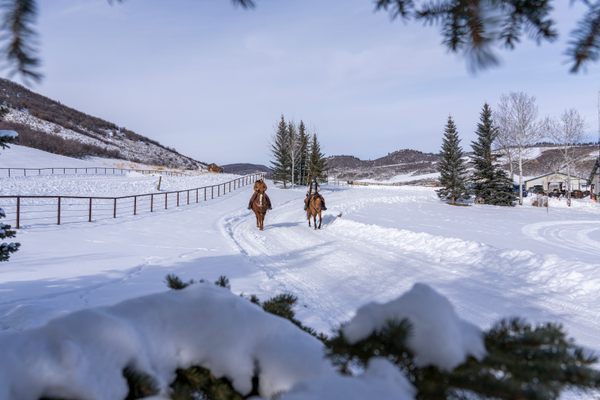 Enjoy stunning winter vistas on horseback at Saddleback Ranch