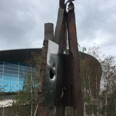 The SINCE 9/11 World Trade Center Artwork, with the London Aquatic Centre behind it.