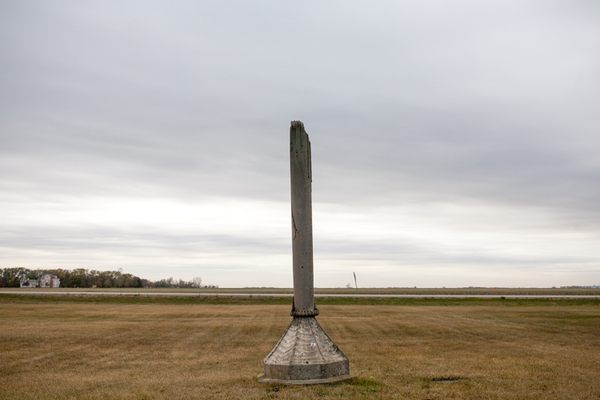 The monument stands in a lonely cemetery.