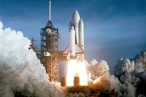 STS-1, the Space Shuttle Columbia, launching on April 12, 1981, from Kennedy Space Center in Florida.