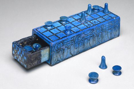 An ancient senet board inscribed with the name of Amenhotep III, with a sliding compartment for pieces, dating to the 14th century B.C. 