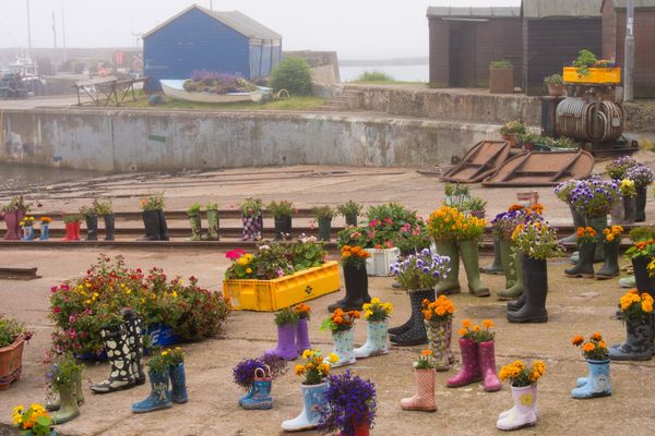 The old wellies decorate the slipway at the St Monans harbour.