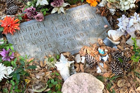 Gravesite of Robert E. Harrill, The Fort Fisher Hermit.  It reads "He Made People Think"