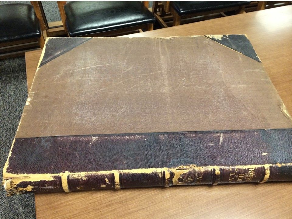 David Roberts's <em>The Holy Land</em>, a book Kindred was lowering down the side of the building the night he was caught. The rope marks and spine damage on its cover are still visible.