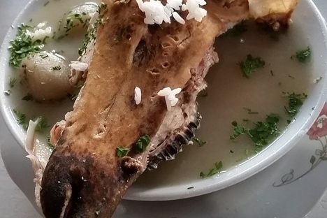 Some bowls of caldo de cabeza come topped with half a sheep's face.