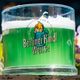 Berliner weisse, flavored with green woodruff syrup. (Yes, that's a child in a mug on the brewery's logo.)