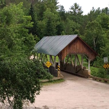 A covered bridge marks all that has been lost