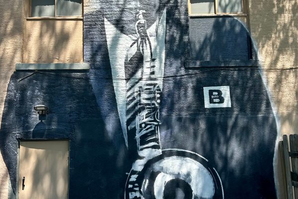 A mural on the side of the building was painted by local artist Alexander Austin in honor of area native jazz great Charlie “Bird” Parker.