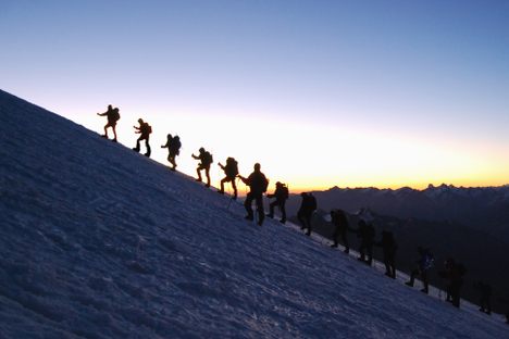 Climbers ascend Mount Elbrus.