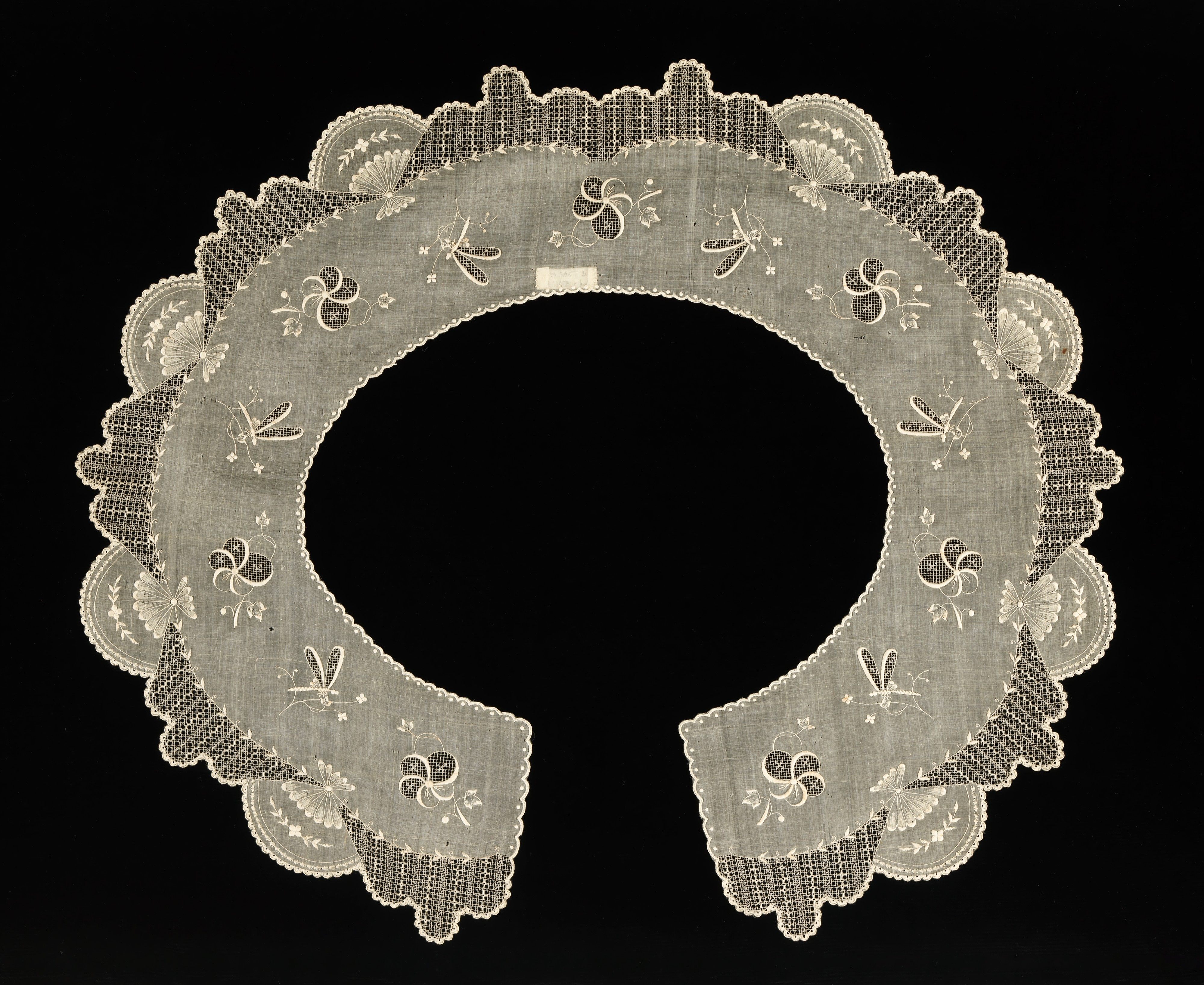 This made-in-the-Philippines piña cloth collar dates back to the 1890s.