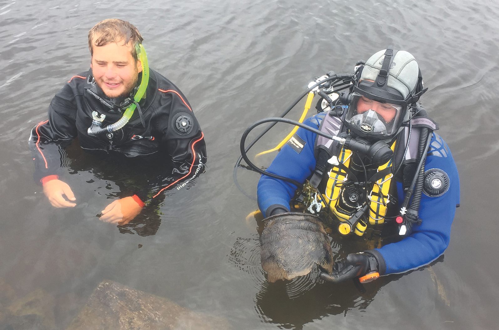 Recovering fragments of vessels—like this one, pulled from Loch Langabhat in 2017—is a cold, dark effort, where sediment limits visibility.