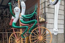 Scallion cyclists greet you at the entrance.