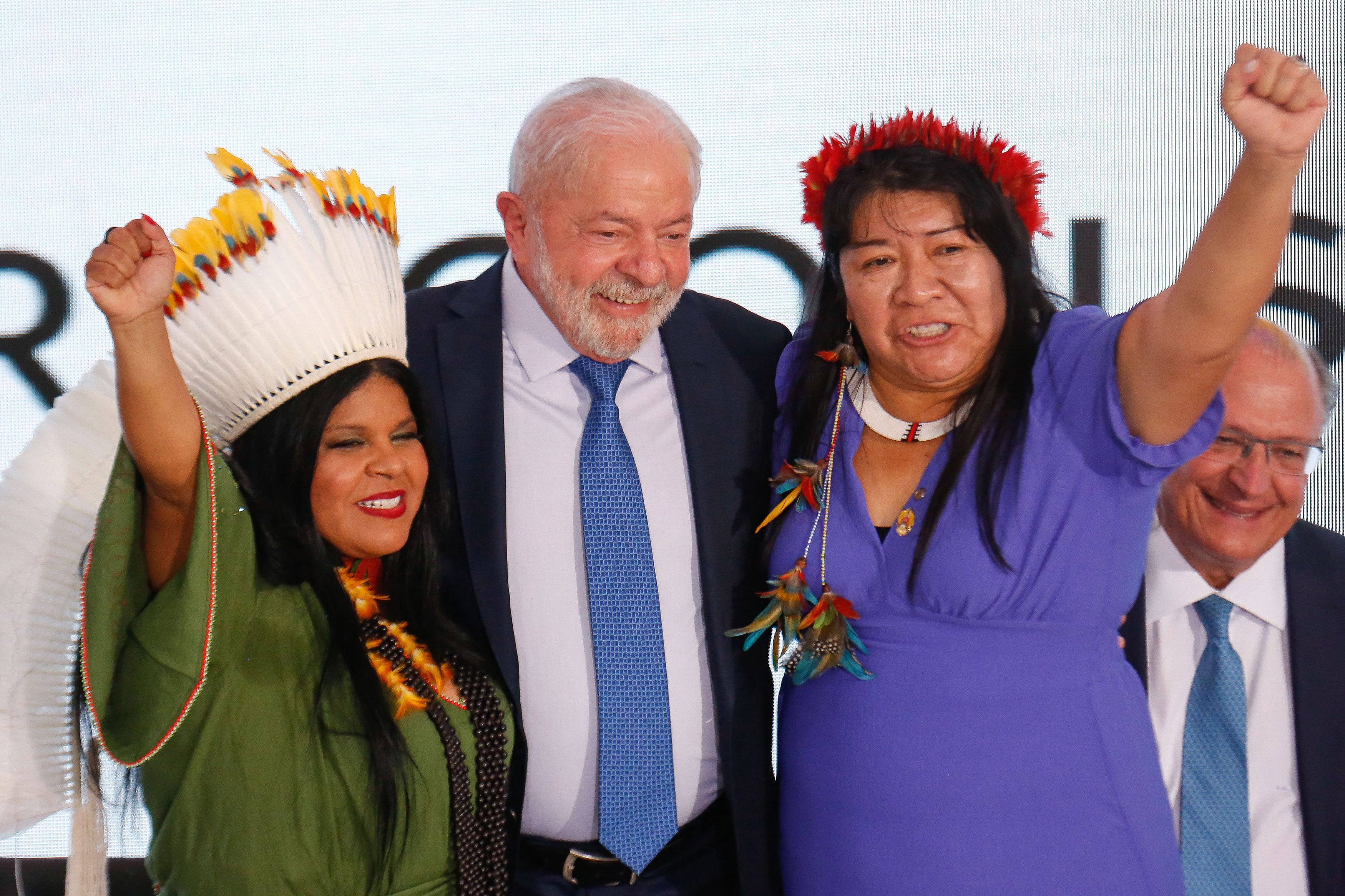 Brazil's Minister of Indigenous People, Sonia Guajajaral; President Luiz Inácio Lula da Silva; and Congresswoman Joenia Wapichana (left to right).