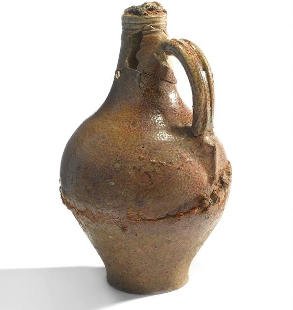 A close-up view of the Holywell witch bottle.