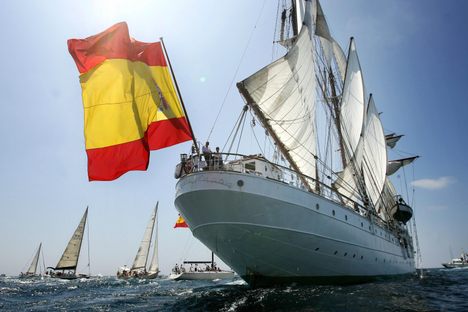 The Spanish tall ship Juan Sebastian Elcano leaves the port of Cadiz during the 50th edition of the Tall Ships Race in 2006. The vessel serves as both naval training tool and international envoy and emblem.