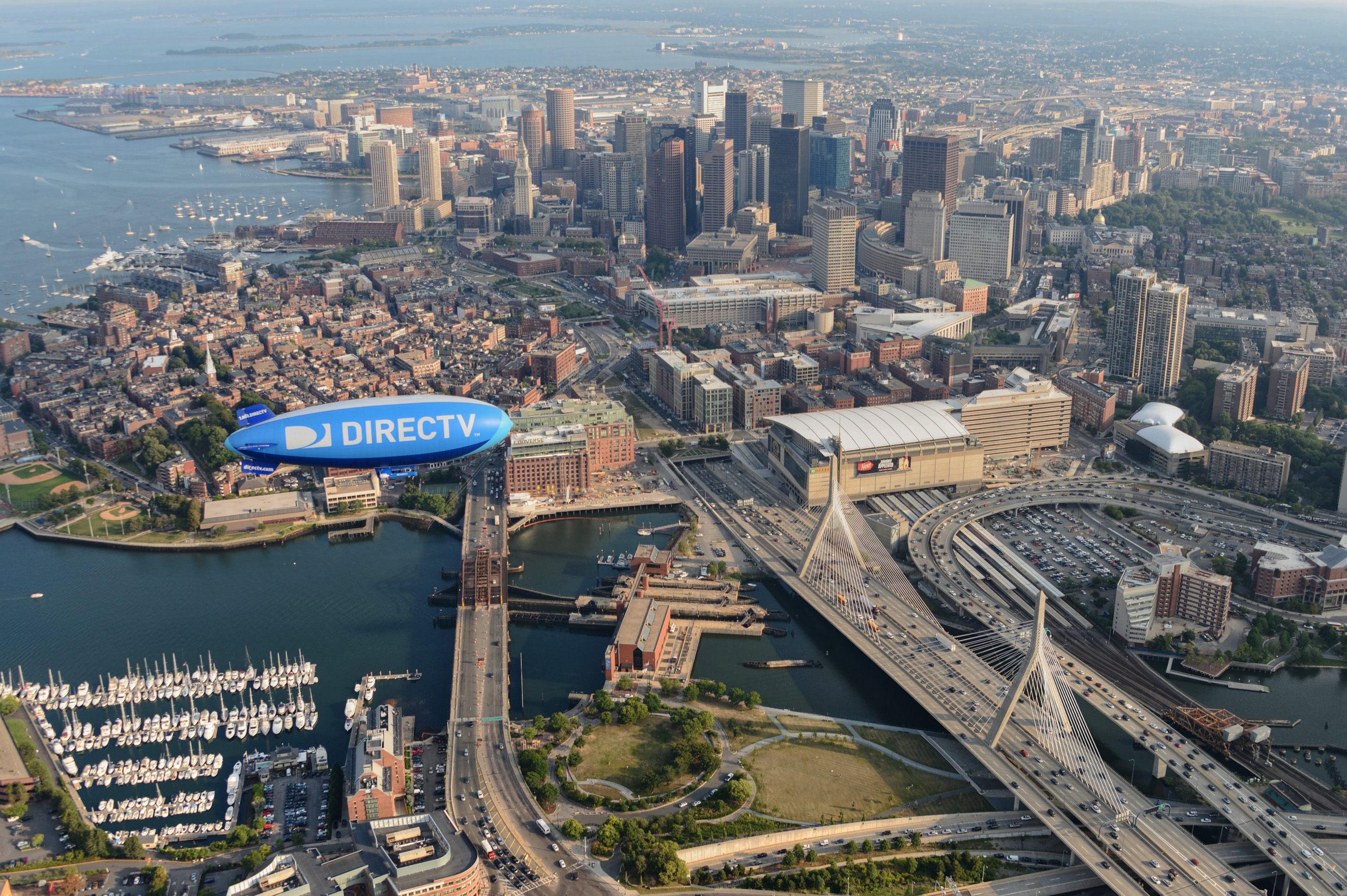 The DirectTV Blimp beats the traffic over Boston.