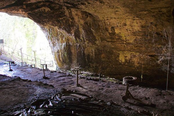 Rope making equipment in the cave mouth, looking out.
