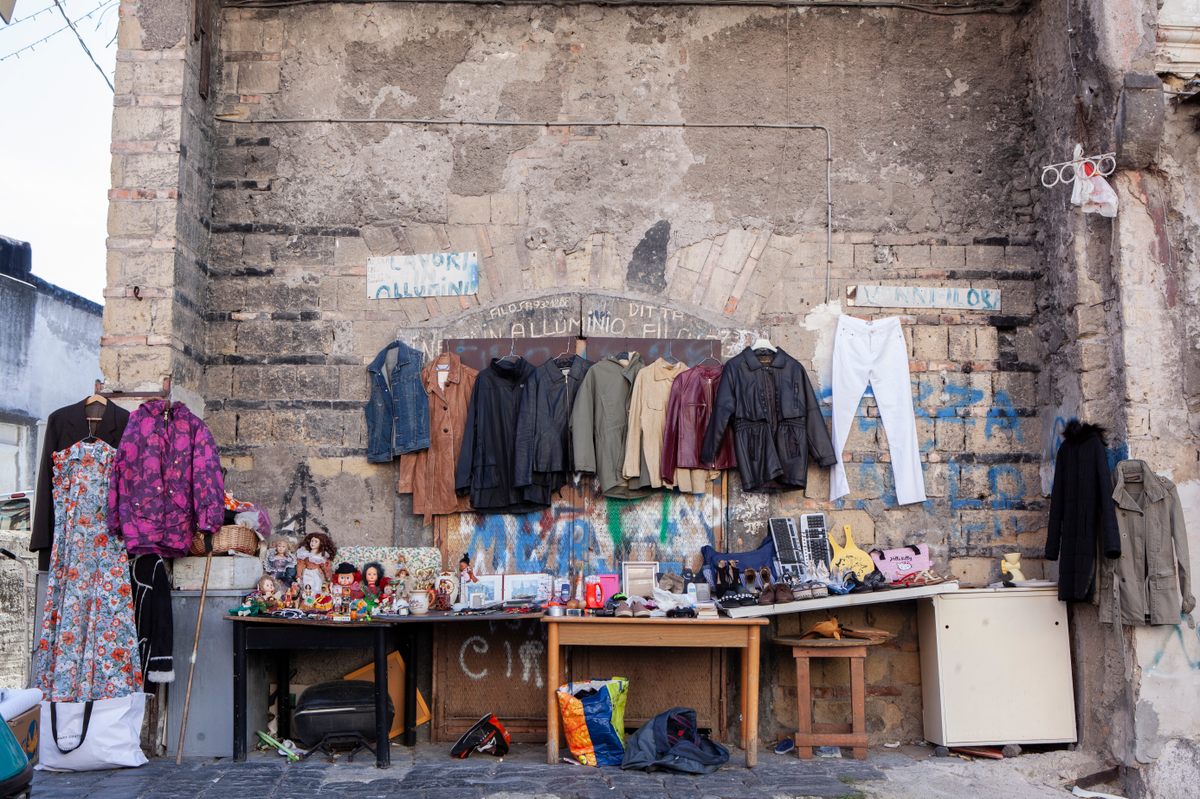 Sellers display their wares on mannequins, tables—even on buildings' walls.