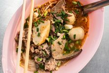 Customize your bowl with sliced pork, pork balls, fish cake, and offal.