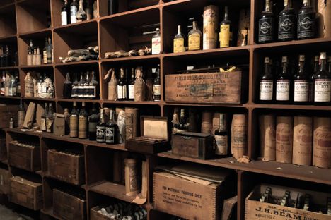 Bottles upon bottles of whiskey, neatly organized and hidden for a century.
