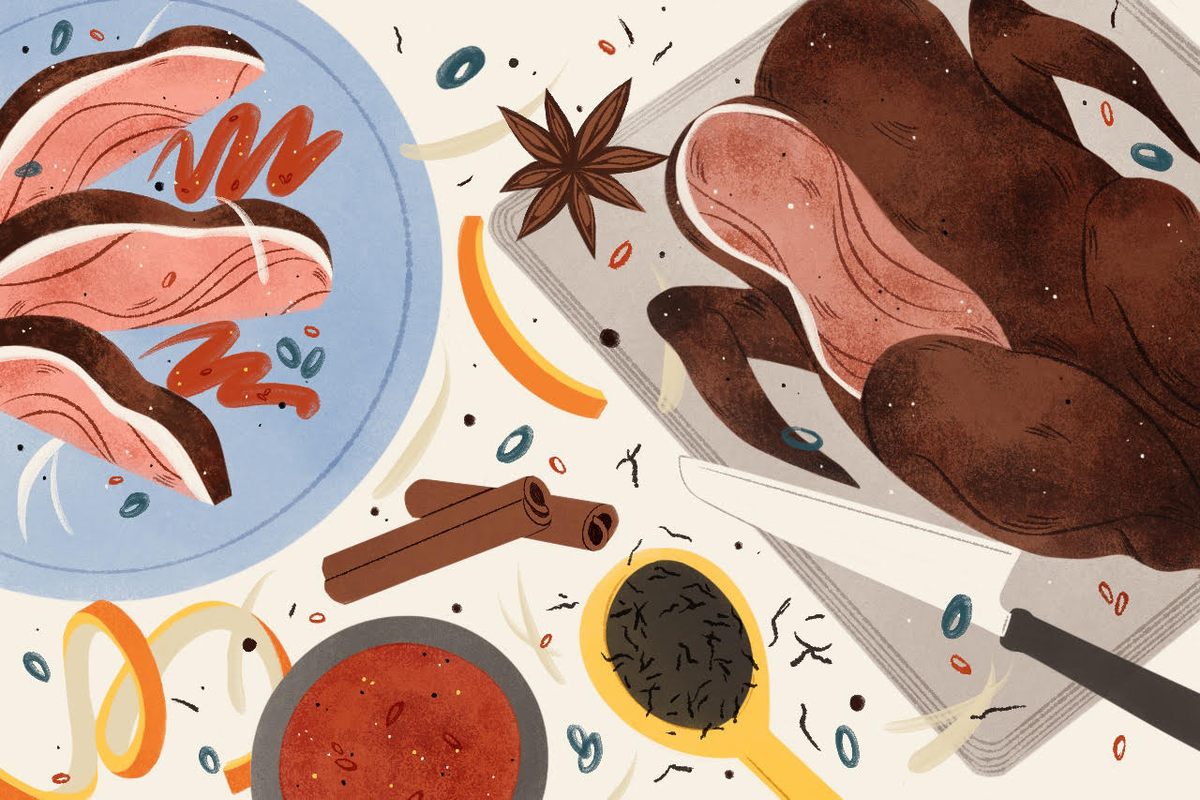 In addition to wood chips, tea-smoked duck calls for heating black tea, rice, orange peels, cinnamon, and star anise.