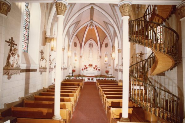Archival photo of the staircase inside Loretto Chapel.
