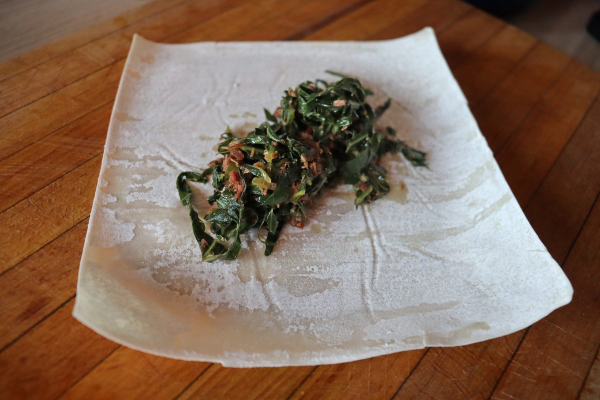 Twitty's <em>Koshersoul</em> Spring Rolls are filled with collard greens and kosher pastrami.