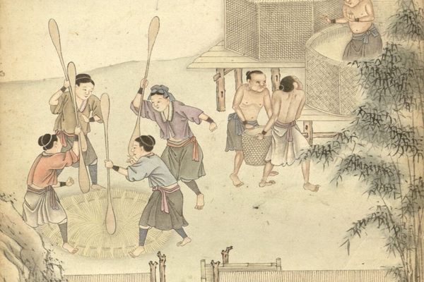 Indigenous Taiwanese women and men working together to prep and store grain.   