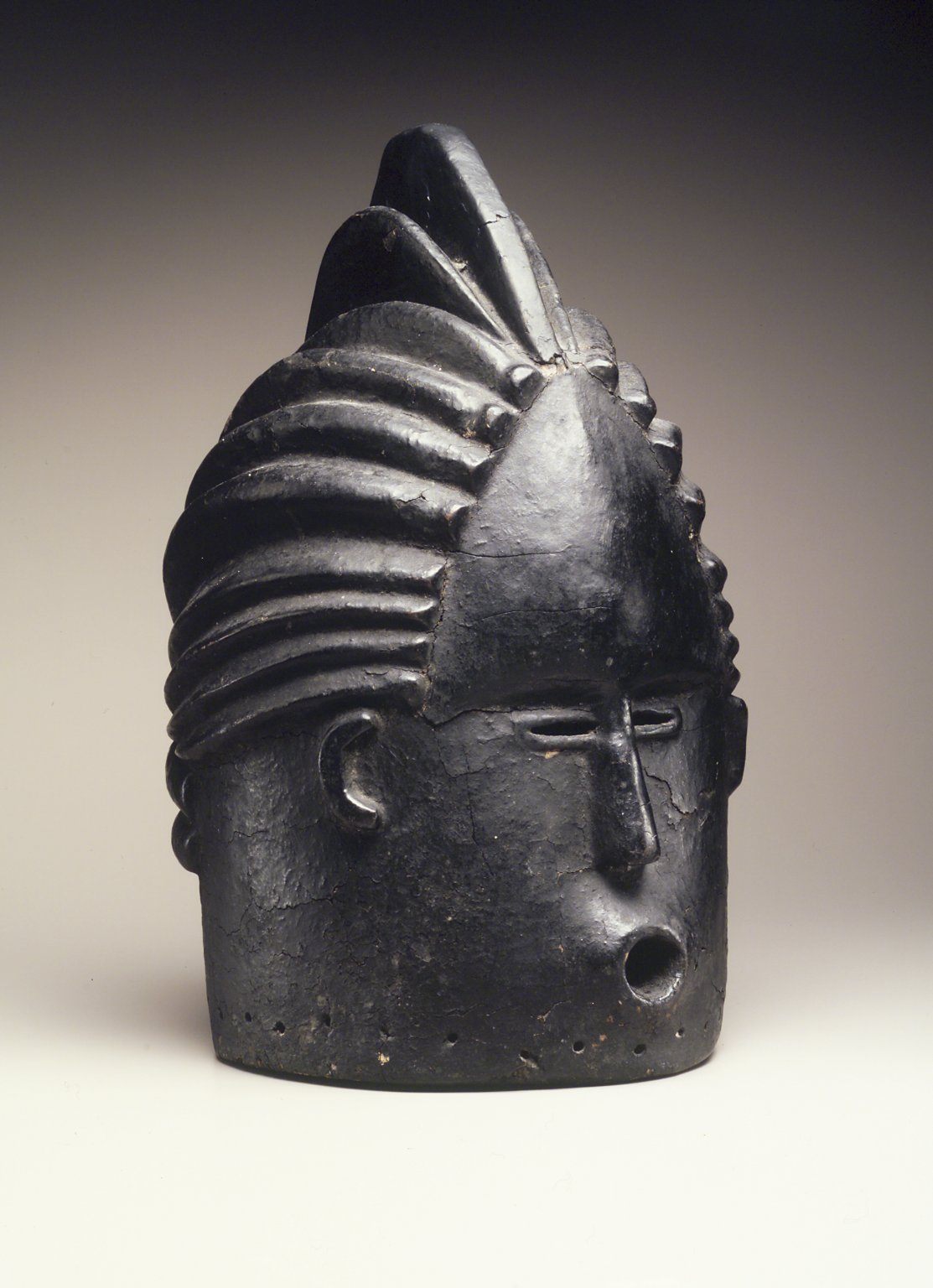 This "helmet mask," made of wood and tar, dates to the early 20th century and is currently in the collection of the Brooklyn Museum, in New York.