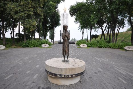 The statue of a frail girl is a tribute to the millions of children who perished.