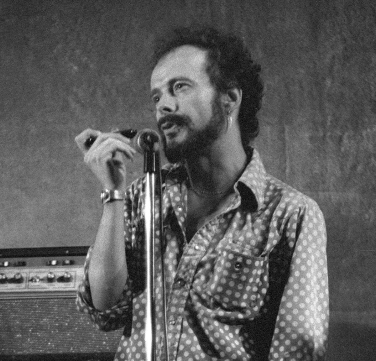 Tony Glover, with his trusty harmonica, in 1982.
