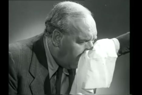 Watch How to Properly Sneeze into a Handkerchief in 1940s England