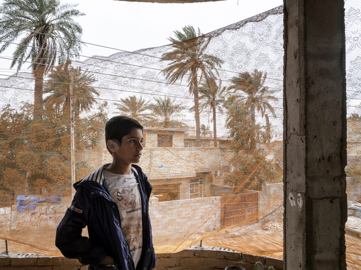 Hussein, the young protagonist of <em>Hanging Gardens</em>, on set in an area where Shiite militias have a strong presence.