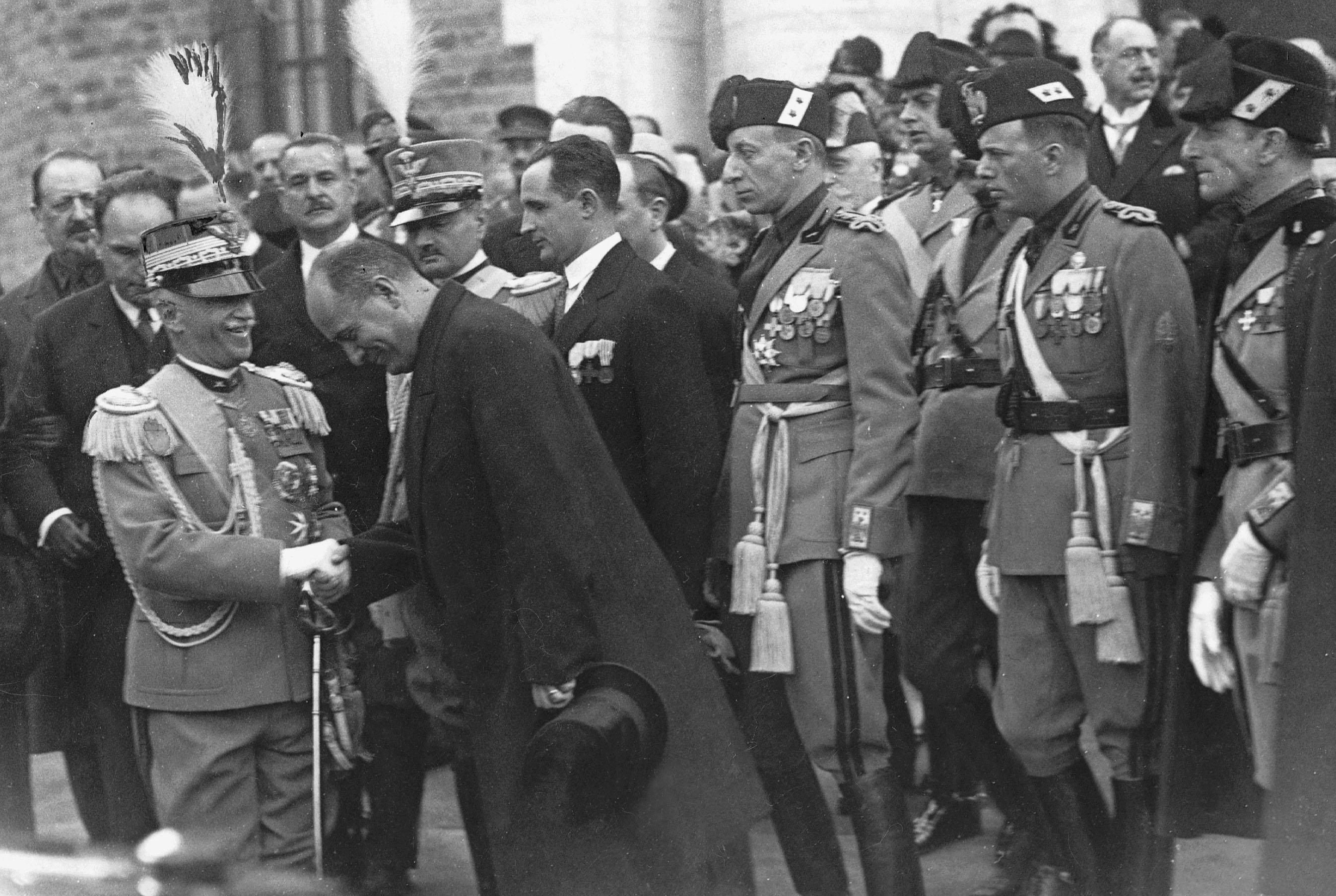 Filiberto's great-grandfather, Vittorio Emmanuele, greeting Benito Mussolini in 1928.