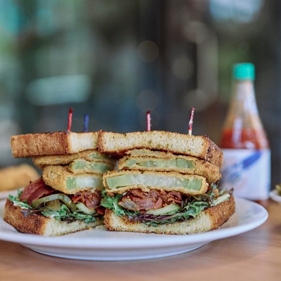 The fried green tomato sandwich comes on jalapeño cornbread toast.