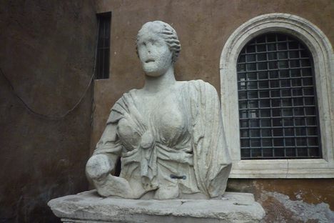 The clothing of the statue suggests its Isiac origin.