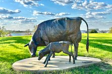 Bronze sculpture of a cow and a newborn calf, Toledo, Iowa