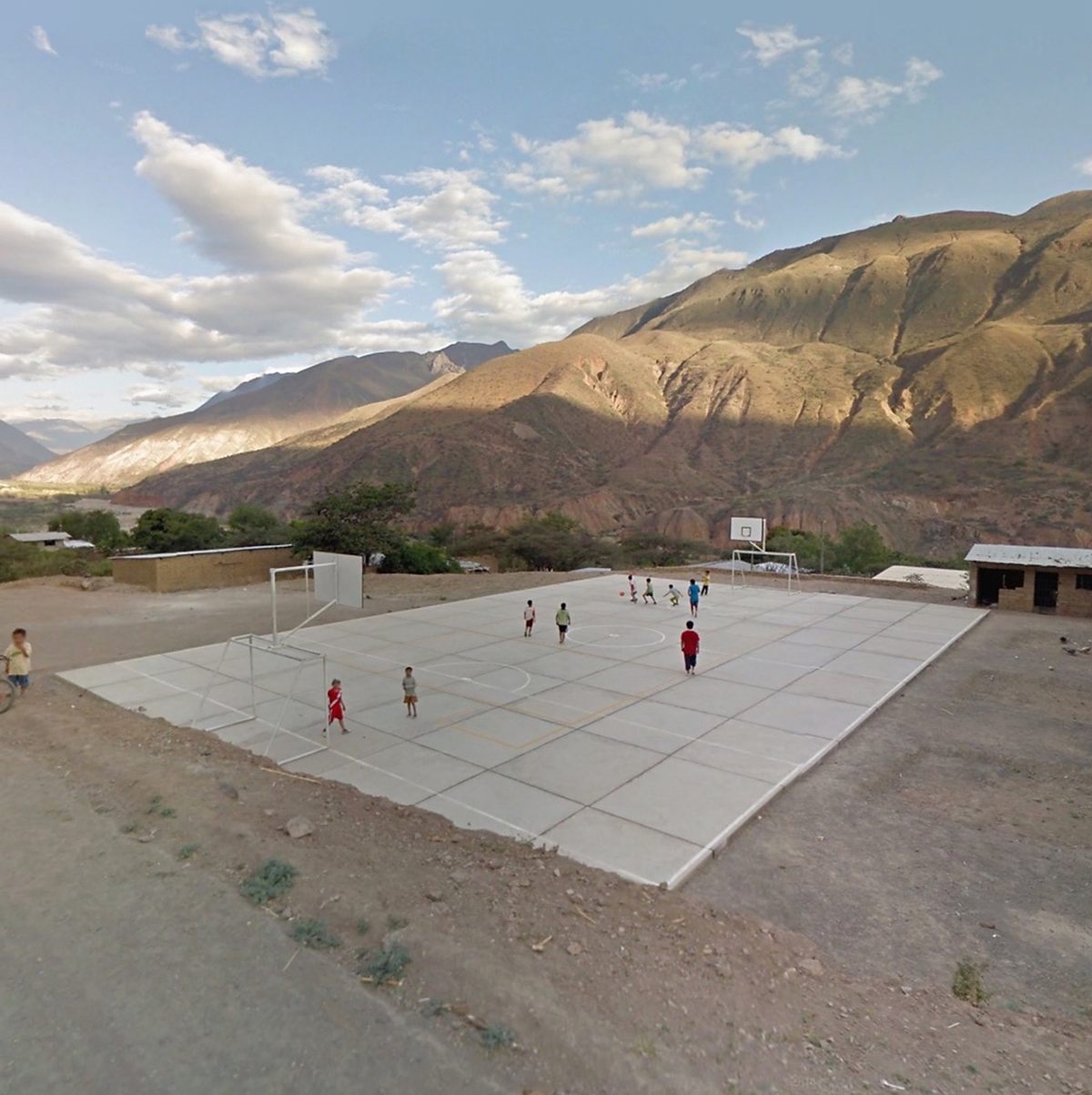 Kenny appreciates how the perspective of Street View makes people look miniature, like these children on a sports field in Peru.