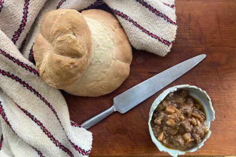 The finished cottage loaf, left, with a simple version of boeuf en daube.