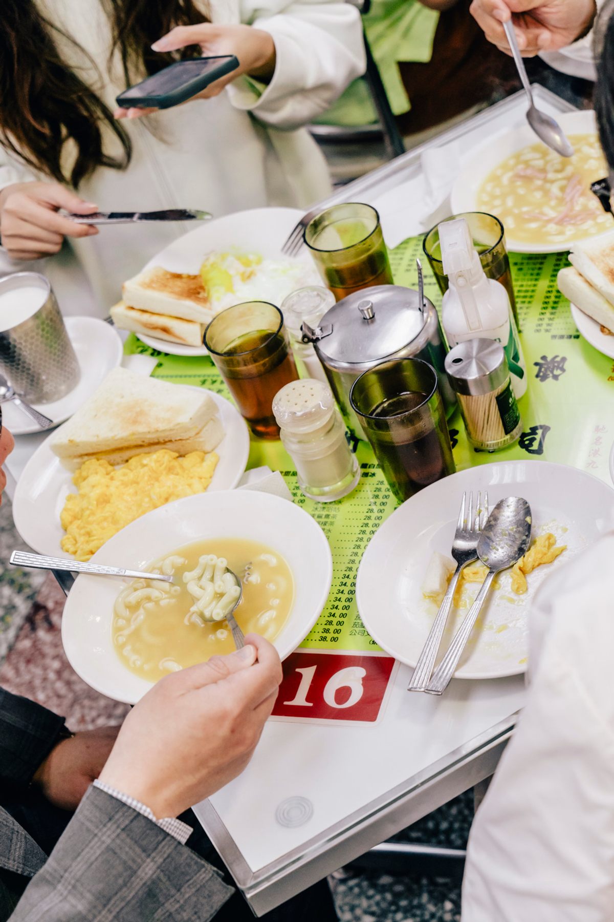 A meal at the Australian Dairy Company includes fluffy eggs and macaroni soup.