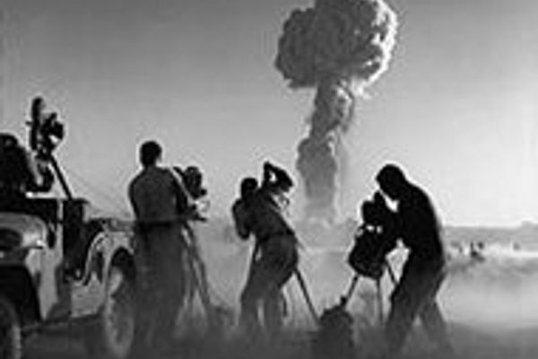 "Atomic" cameramen photographing atomic bomb test