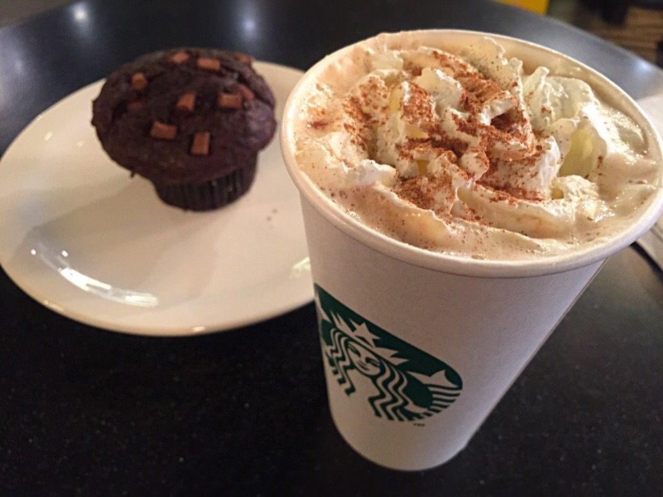 Ingredients include: spice flavors, milk, espresso, whipped cream, topped with pumpkin pie spice.
