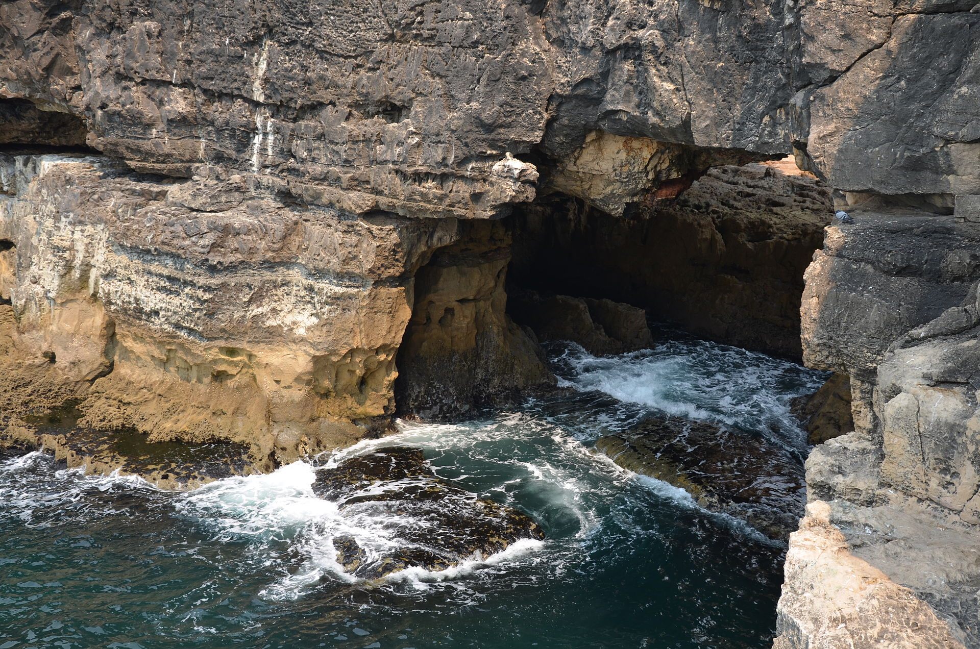 Opening to a cave at Boca do Inferno.