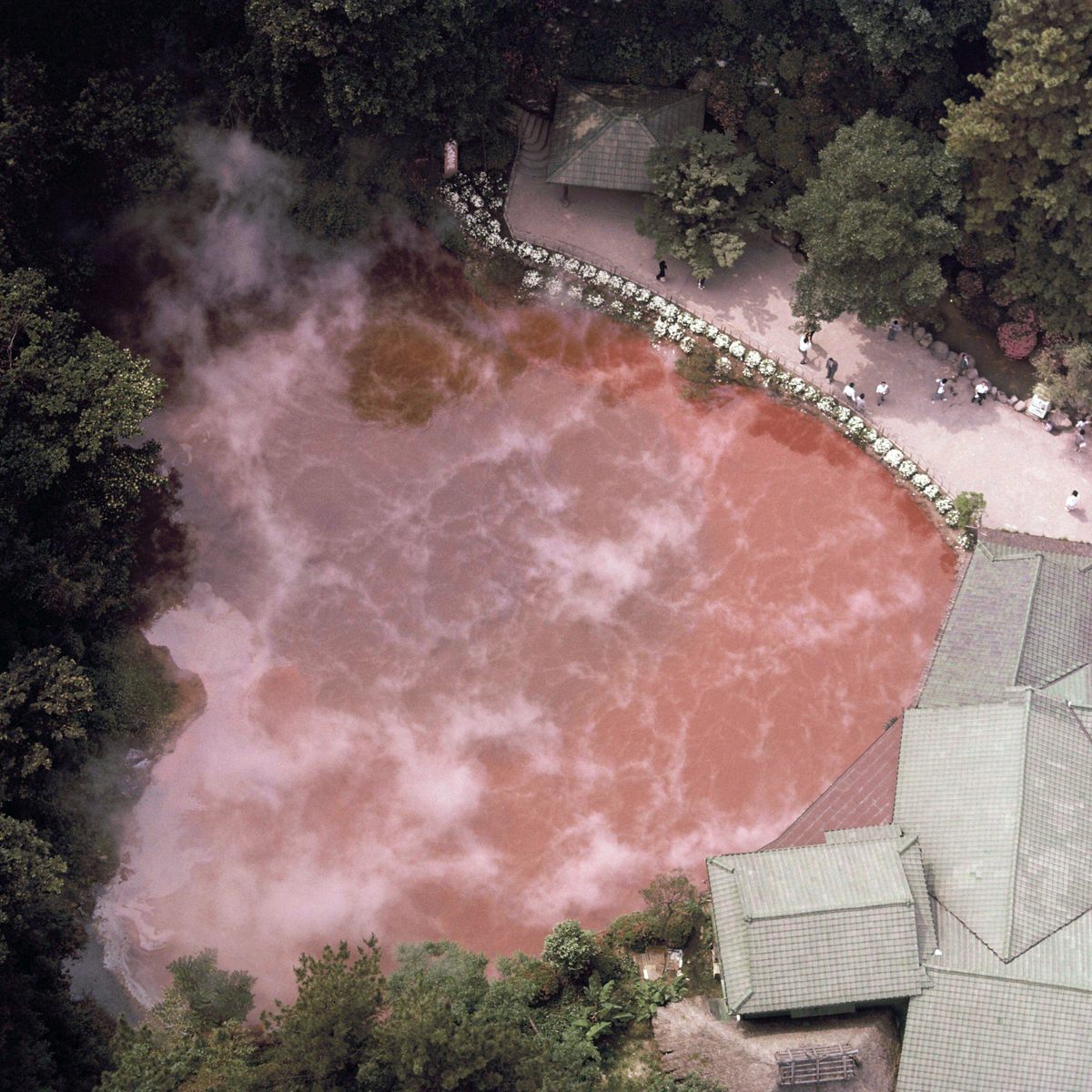 An aerial view of Beppu's blood-red Chinoike Jigoku hot spring.