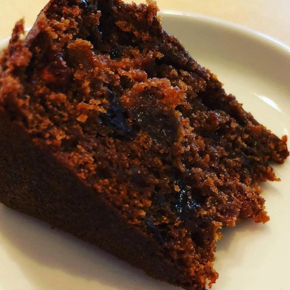 A slice of black cake baked by Mrs. Annemarie Charles, from San Fernando, Trinidad.