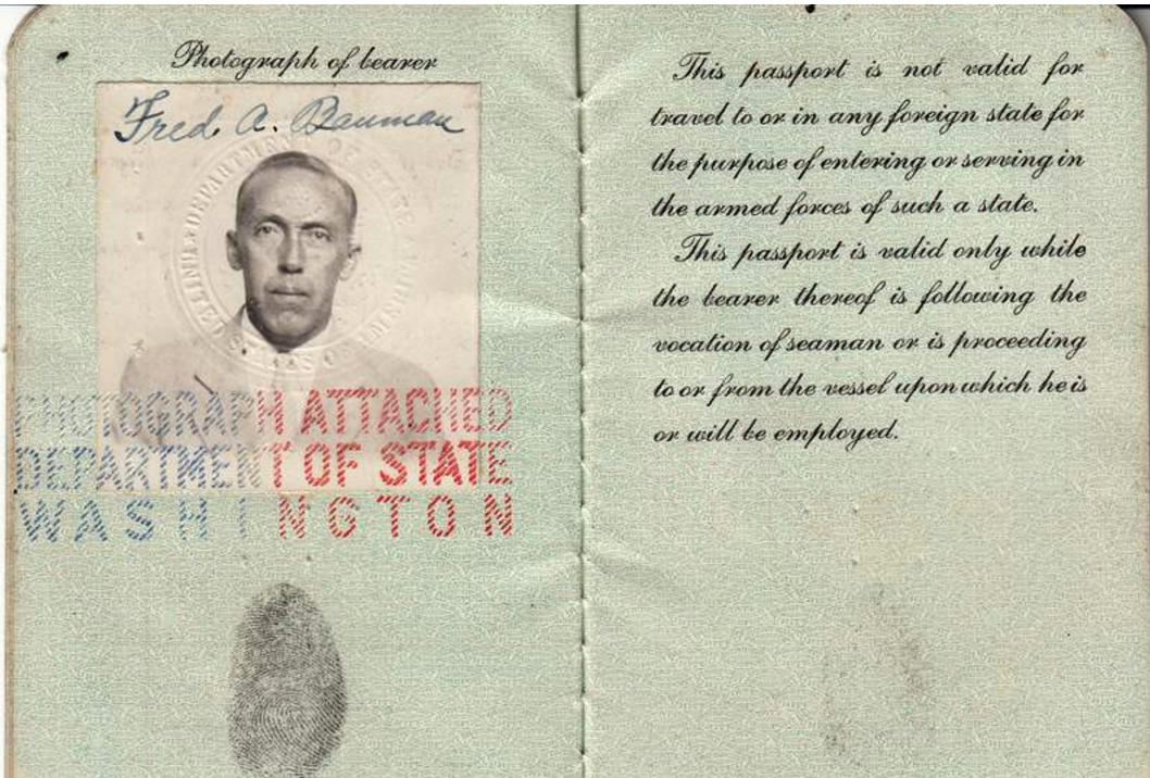 The photo page of Fred Albert Bauman's Seaman Passport.