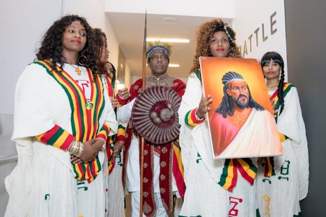Celebrants bearing a portrait of Tewodros at the handing-off ceremony.