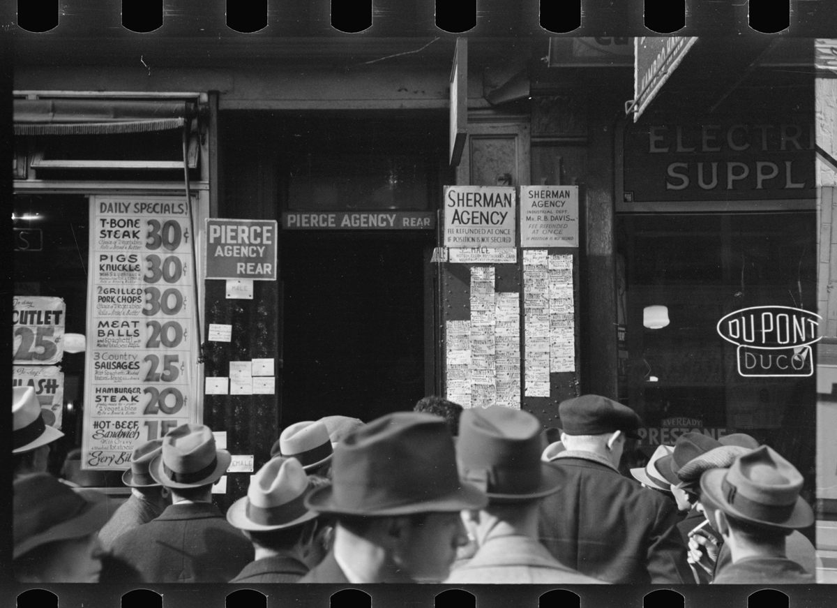 <em>Employment agency on Sixth Avenue, New York, New York.</em>