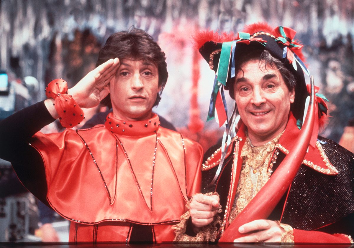 Italian actor, singer-songwriter, and music producer Tony Renis and Italian actor Gianni Cajafa on <em>Stryx</em>.